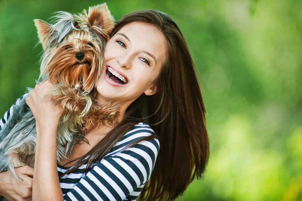 Depositphotos pet sitter with Yorkie.jpg
